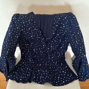 Bebe size 8 lined peplum top.